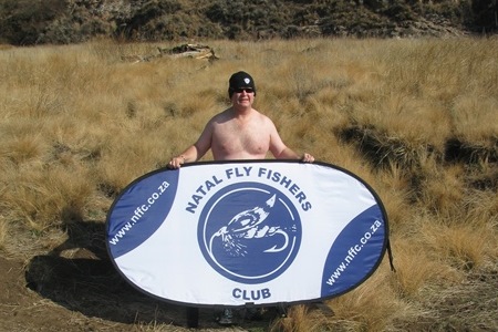 near nude natal flyfisherman